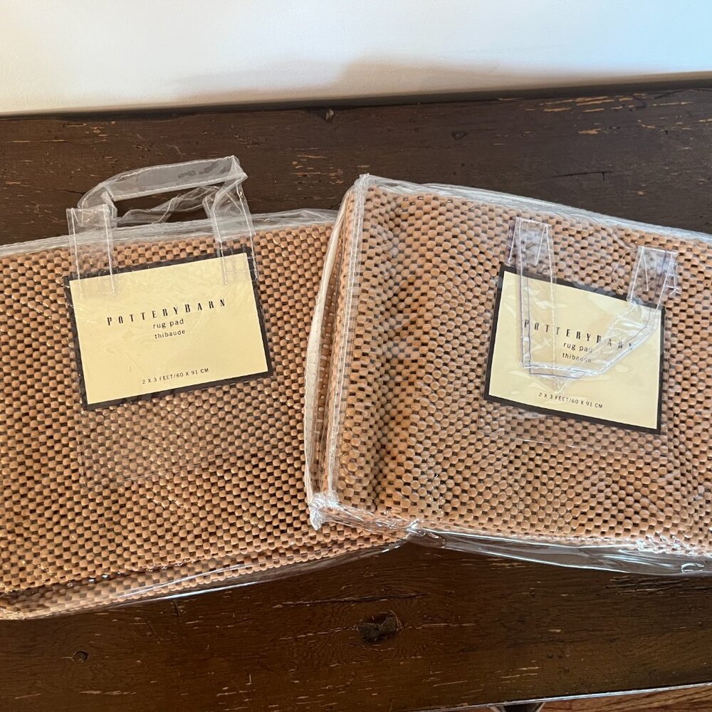 Two Pottery Barn Rug pads 2x3